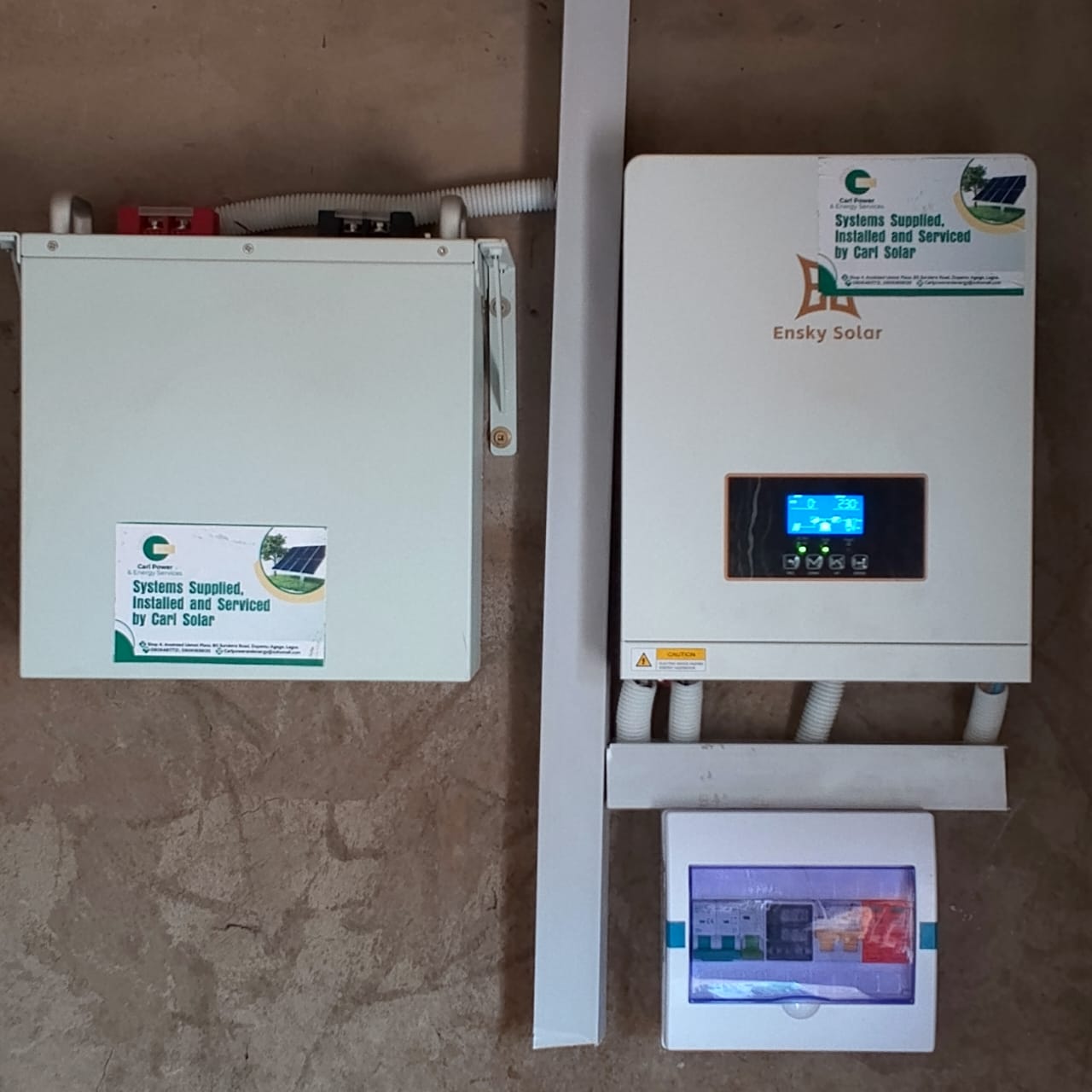 Carl Solar branded hybrid inverter and battery installation